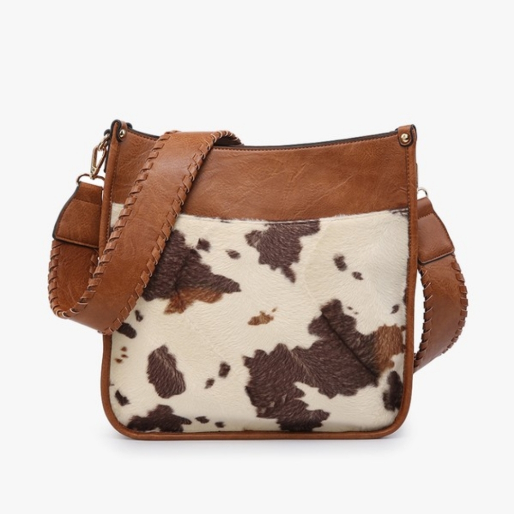 Brown Vegan Leather And Cowhide Crossbody only used a few times new condition
